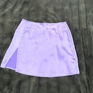 Motel Rocks purple satin skirt with a small side slit. Size M